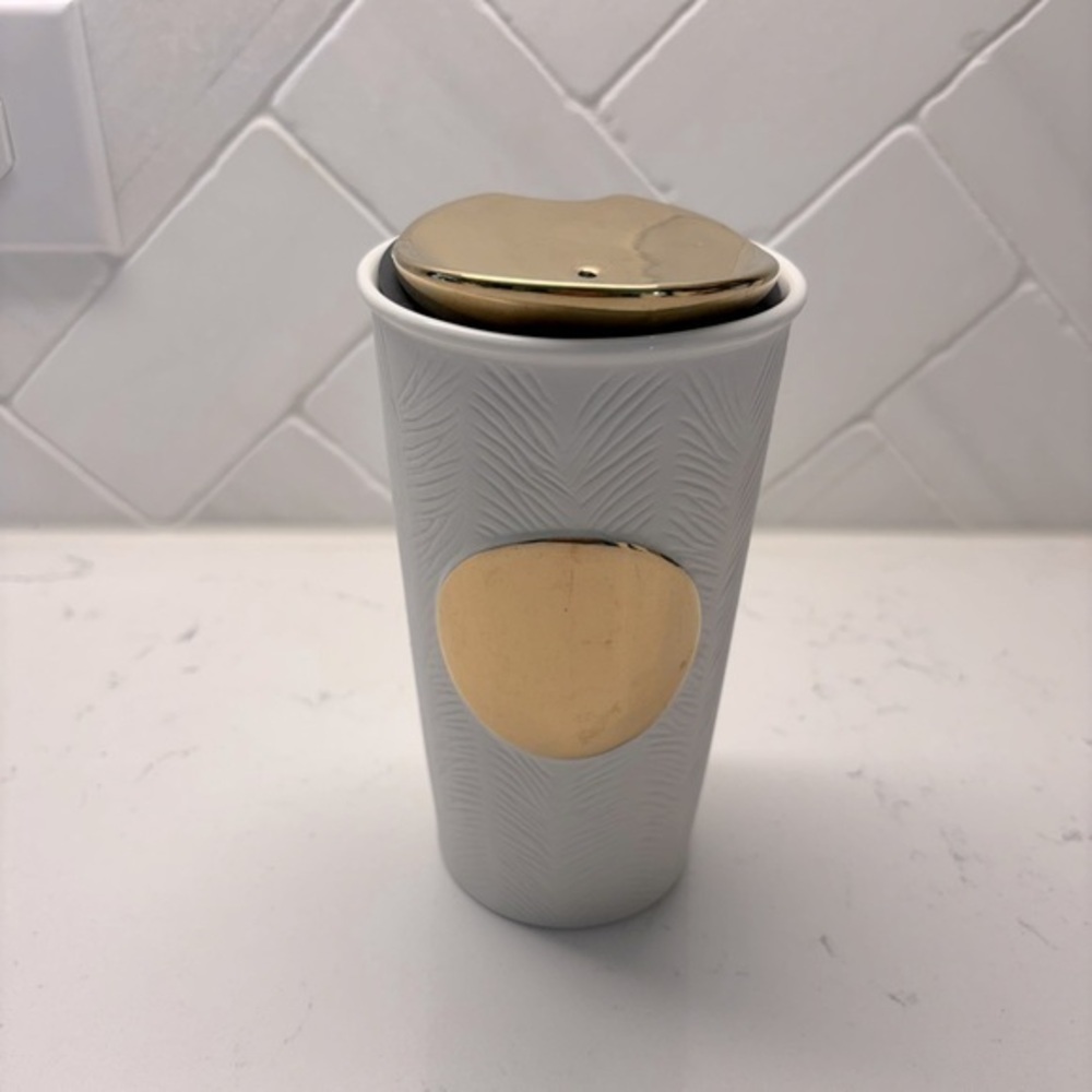 Starbucks’s Ceramic Elegant White and Gold Traveling Mug 10 fl oz